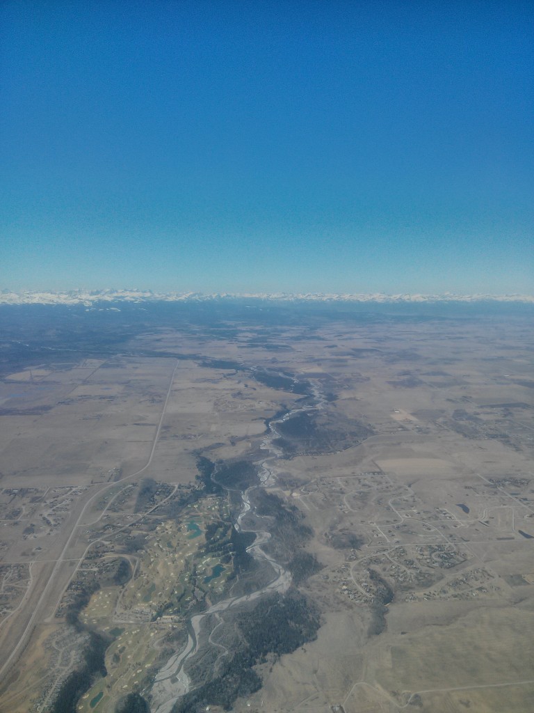 Calgary's main river from the air. It snakes down from the mountains and will flow into the hudson bay.