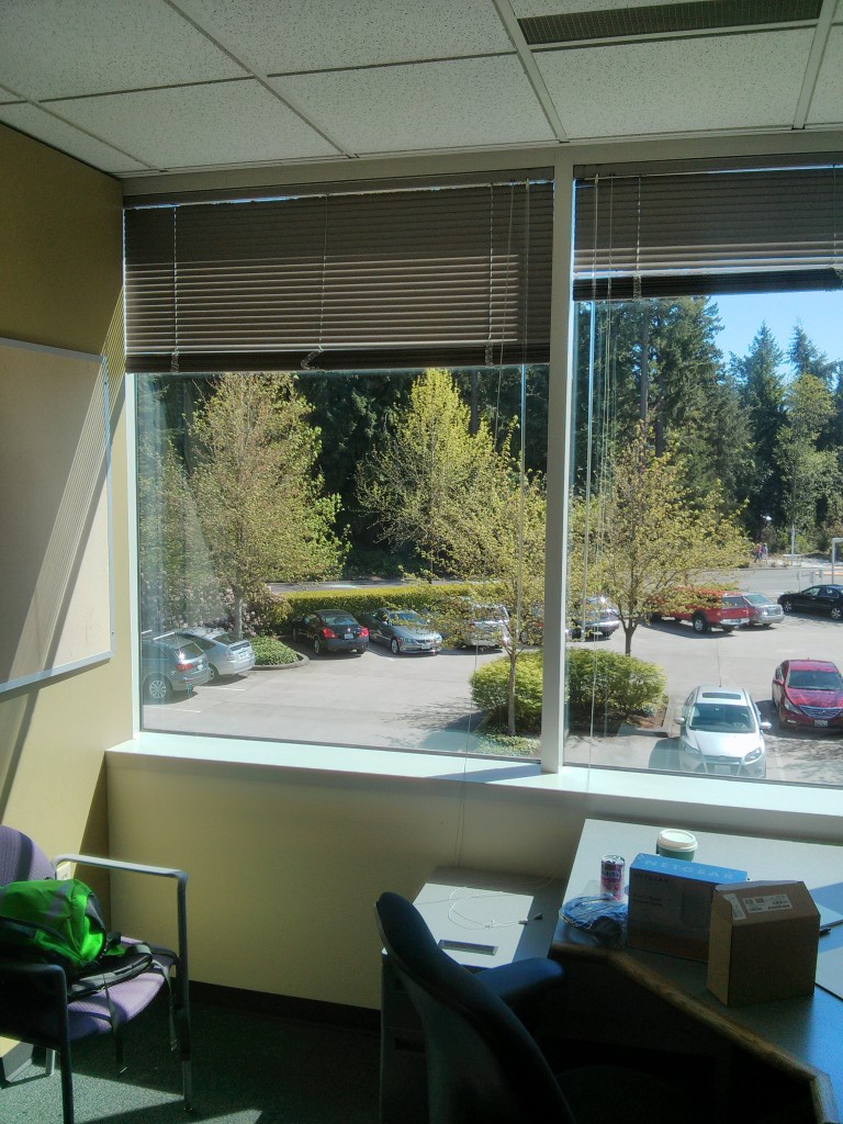 The view from my temporary office. A recent re-organization left open an office right between my mentor and our boss.